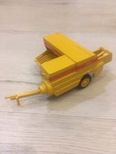 Ancienne Presse à balles New Holland 940 marque NZG Rare au 1/32 eme??