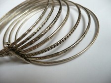 Ancien bracelet semainier en métal argenté