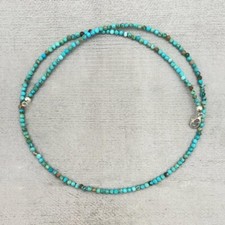 Véritable collier long de