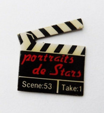 RNT 4/ pin's clap de cinéma