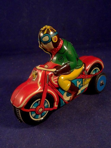 Ancien jouet tôle moto