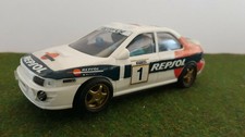 Voiture SLOT SUBARU # 1 REPSOL