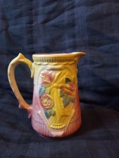 Petit pichet ancien en barbotine rose et jaune pot à lait art déco