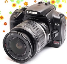 Appareil photo reflex numérique X Canon EOS Kiss avec objectif zoom adapté au...