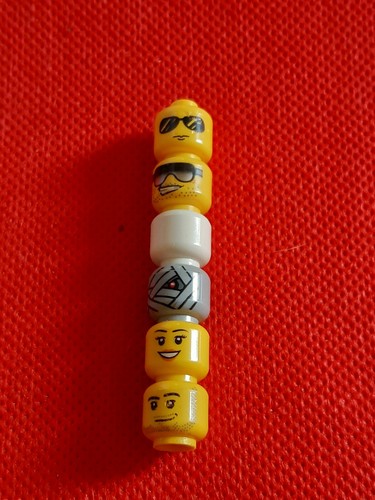 Lot pièces lego tête - de,