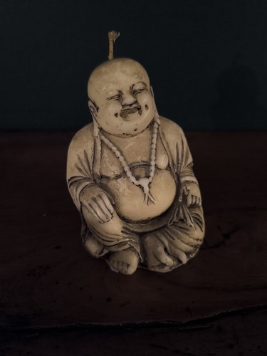 Ancienne bougie bouddha - ancienne,