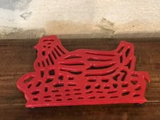 Dessous de plat en fonte