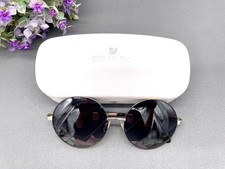 Lunettes de soleil Swarovski verres noirs
