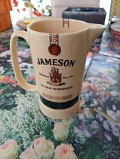 JOLI PICHET CERAMIQUE-PUBLICITE-WHISKY JAMESON -H:16 CM-ETAT COMME  NEUF