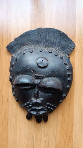 Masque africain terre cuite