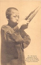 China - A young college student from the college marching band playing the mouth