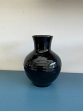Vase céramique noir signé