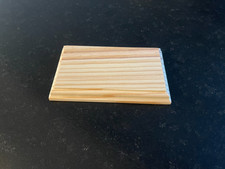 socle en bois brut pour