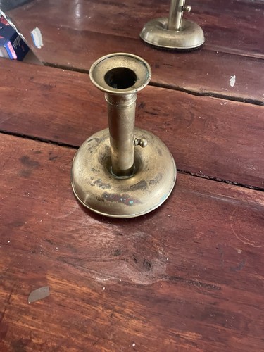 Bougeoir poussoir bronze - à,