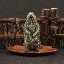 Figurine de marmotte en