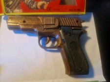 Defender-  jouet à amorce en  métal    neuf