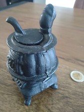 Petit poèle à bois en fonte, objet de fumeur