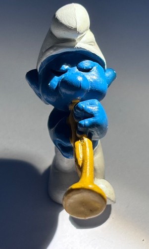 Schtroumpf joueur trompette - de,