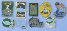 lot de 9 pin's peche, amorce, fabricant (sensas,x21,silstar......)