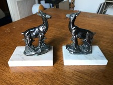 PAIRE DE SERRES LIVRES  ORNÉS