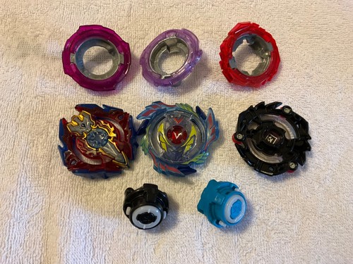 Beyblades assorted parts - beyblades,