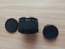 Objectif Sigma 28-80mm f/3.5-5.6 + filtre cokin skylight 1A 62mm + étui rigide