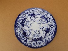 Creil et Montereau plat rond en faience modèle Flora