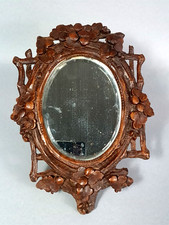 Ancien petit miroir biseauté cadre bois sculpté patine cirée C714