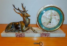 Pendule marbre et bronze" animaliers" à poser