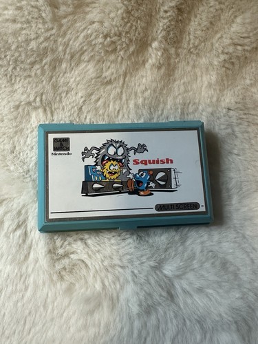 Nintendo game watch squish - &,