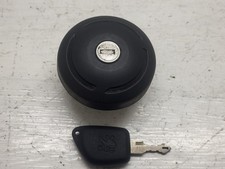 Bouchon réservoir avec une