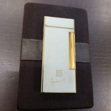 Briquet à gaz GIVENCHY 2000 argent satin occasion rayures dommages pas de...