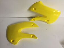 UNE PAIRE DE CACHE ECOPE OUIE CARENAGE D ET G JAUNE SUZUKI 65 RM 110 DRZ 03-04