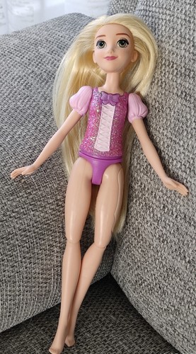 Poupee disney chantante - disney,