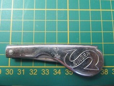 Molette de couture ancienne en acier pliable "Singer "