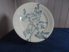 Plat rond faïence marqué