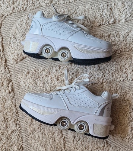 Patins roulettes - à,