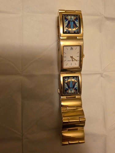 Une montre femme marque - de, de
