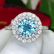 Bague double halo topaze bleue
