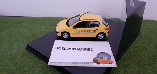 Peugeot 206 jaune poste au - ,