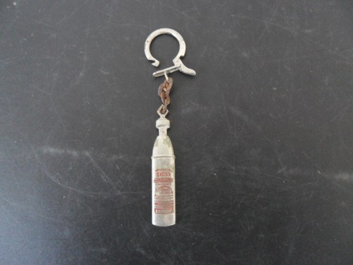 Porte cle ancien publicitaire - porte,