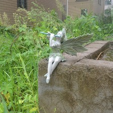 Ornement soufflant flûte fée assise résine magique elfes décoration jardin