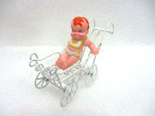 Bébé dans son landau