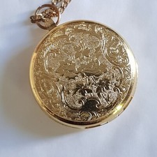 Montre pendentif de femme avec chaine  a QUARTZ ( non fonctionnel)