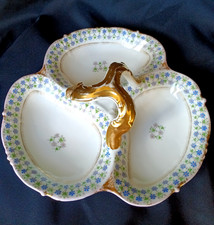 Serviteur muet mendiant en porcelaine de Limoges aux barbeaux