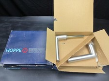 poigner de porte hoppe a rosace a clé alu argent