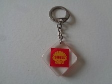 ANCIEN PORTE CLE INCLUSION  COQUILLE SHELL AUTOMOBILE