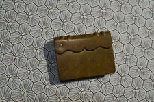 BRIQUET LIVRE, OBJET DE