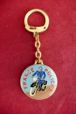 Porte-clés émaillé verni