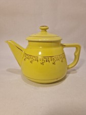 Théière ancienne porcelaine de longchamp jaune et dorures